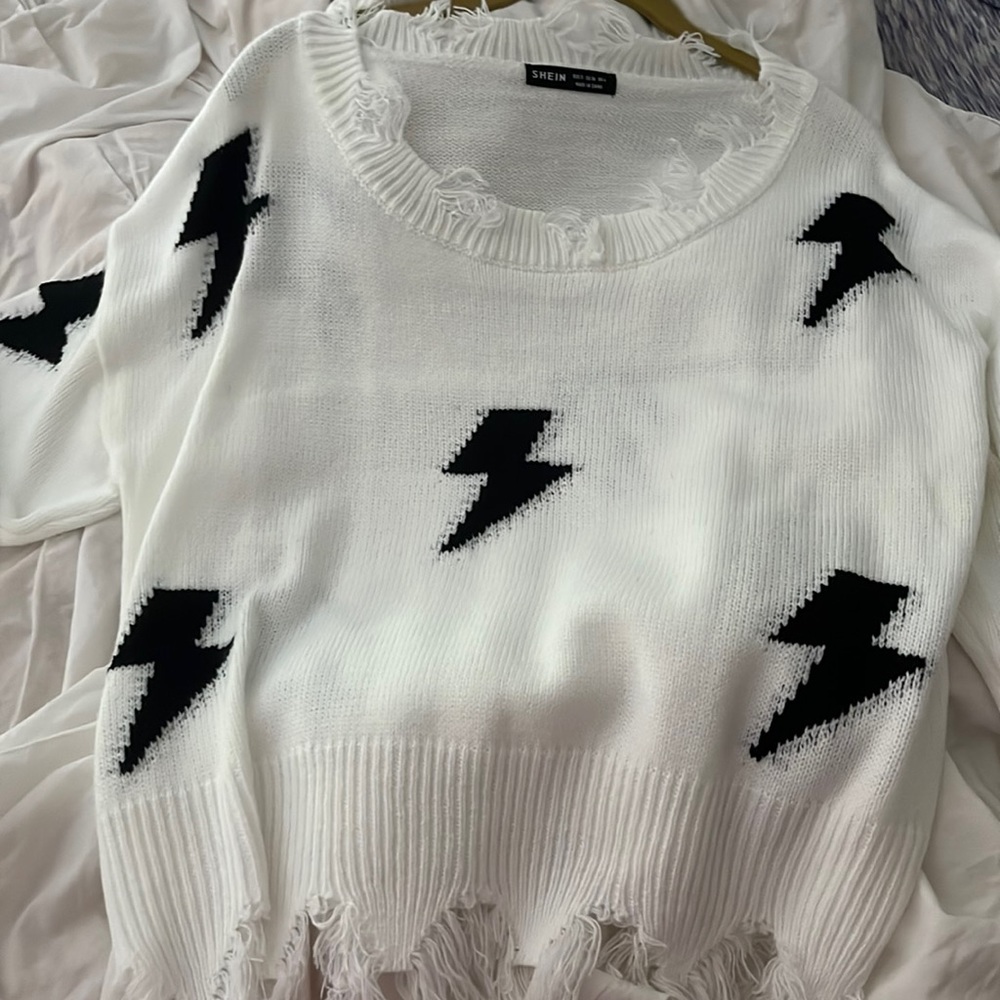 sweater with lightening bolts